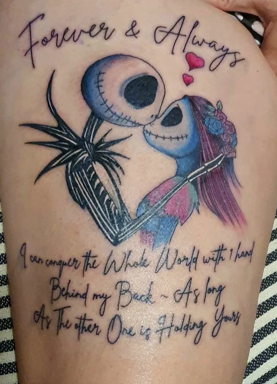 Thigh tattoo of two skeleton lovers kissing, with Forever and Always script and a love quote